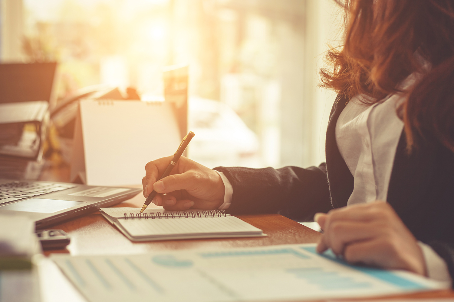 An accountant sitting at a desk.